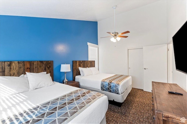2176 S Bear Blvd, Garden City, UT 84028 - carpeted bedroom featuring ceiling fan, a closet, and lofted ceiling