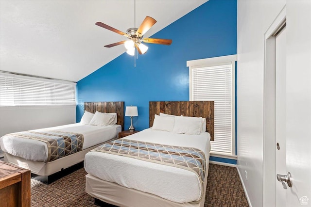2176 S Bear Blvd, Garden City, UT 84028 - carpeted bedroom with baseboards, vaulted ceiling, and ceiling fan