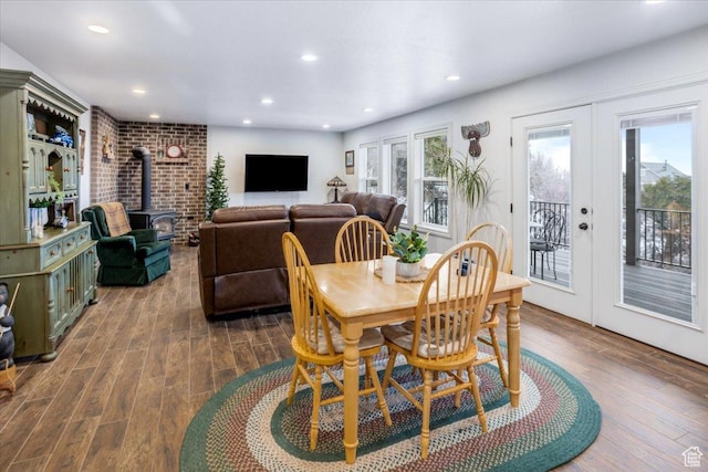 1510 S Mahogany Dr, Garden City, UT 84028 - dining area featuring french doors, wood finished floors, a wood stove, and recessed lighting