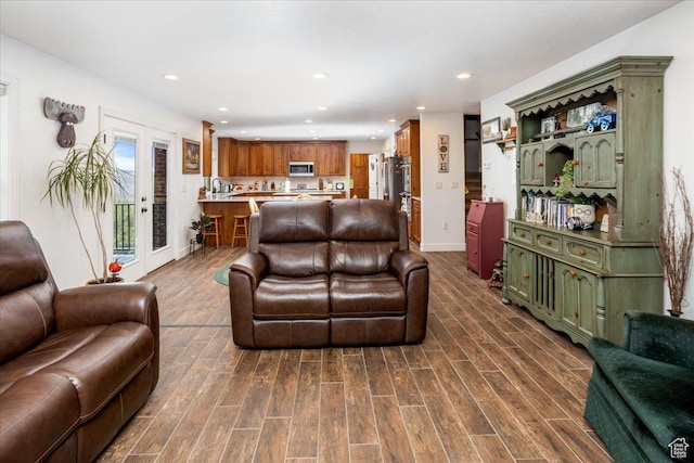 1510 S Mahogany Dr, Garden City, UT 84028 - living area featuring dark wood-type flooring, baseboards, and recessed lighting