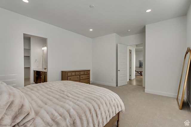 1919 S Sawmill Blvd E, Heber City, UT 84032 - bedroom featuring light colored carpet, baseboards, connected bathroom, and recessed lighting