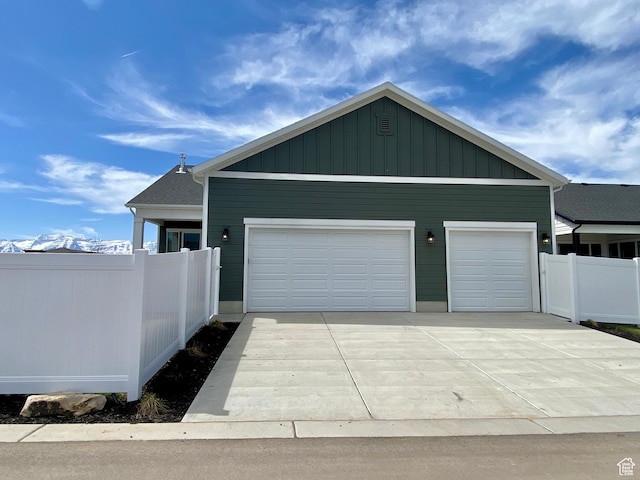 1919 S Sawmill Blvd E, Heber City, UT 84032 - garage featuring fence and driveway
