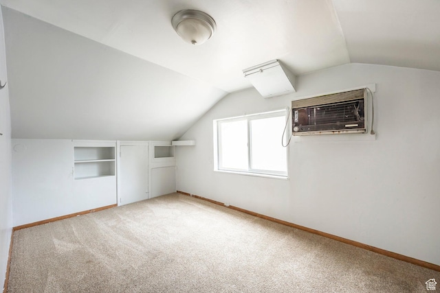 1624 E Maple Ave S, Salt Lake City, UT 84106 - additional living space featuring built in features, light colored carpet, a wall mounted AC, lofted ceiling, and baseboards