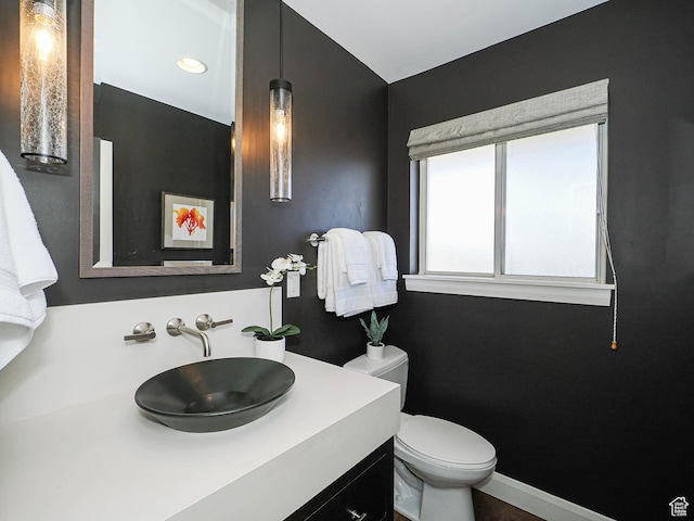 2463 E Michigan Ave S, Salt Lake City, UT 84108 - half bath featuring vanity and toilet