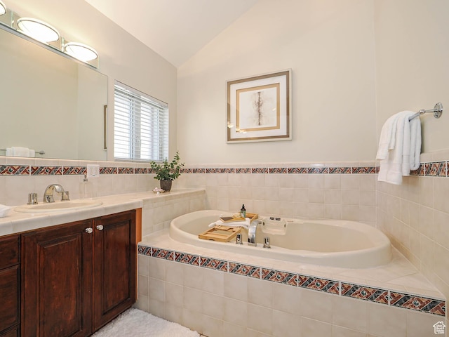 2463 E Michigan Ave S, Salt Lake City, UT 84108 - bathroom with lofted ceiling, vanity, and a garden tub