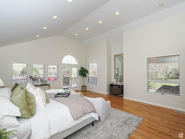 2463 E Michigan Ave S, Salt Lake City, UT 84108 - bedroom with recessed lighting, high vaulted ceiling, access to exterior, french doors, and light wood-type flooring