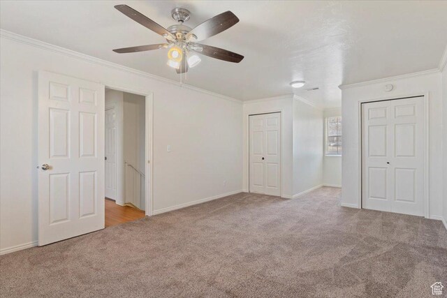 1202 E Mutton Hollow Rd, Kaysville, UT 84037 - unfurnished bedroom with ornamental molding, baseboards, a ceiling fan, and carpet
