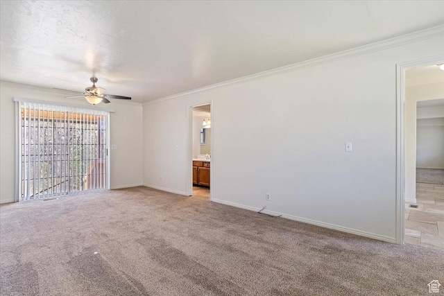 1202 E Mutton Hollow Rd, Kaysville, UT 84037 - empty room featuring baseboards, light colored carpet, crown molding, and a ceiling fan