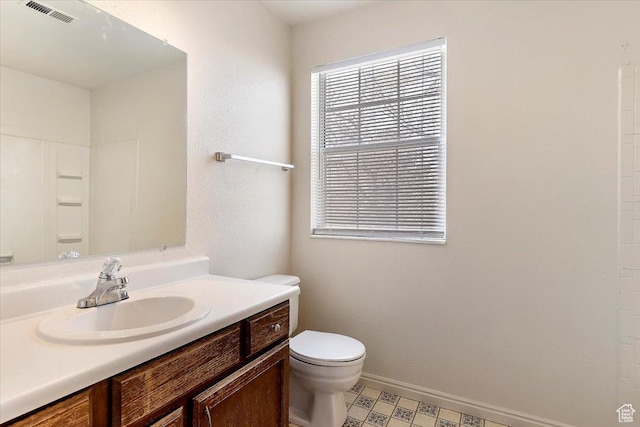 1202 E Mutton Hollow Rd, Kaysville, UT 84037 - bathroom featuring vanity, baseboards, tile patterned floors, toilet, and visible vents