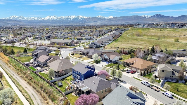 aerial view featuring a mountain view and a residential view