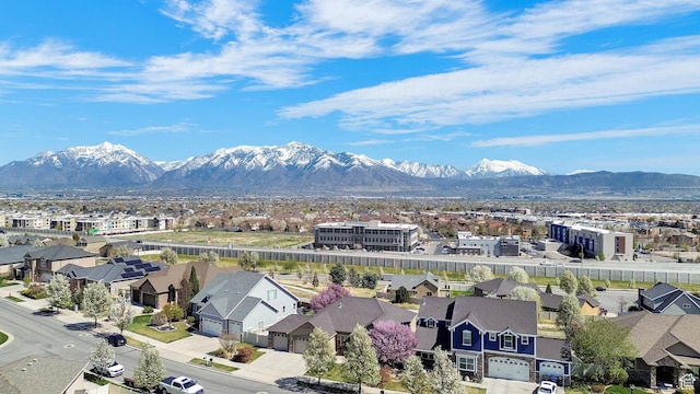 drone / aerial view with a mountain view and a residential view