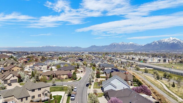 bird's eye view featuring a mountain view and a residential view