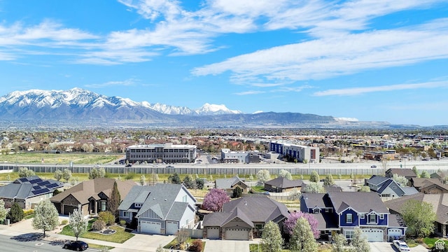 aerial view featuring a residential view and a mountain view