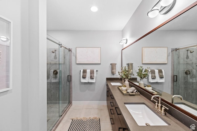 1026 W Chokecherry Dr Unit 135, Mapleton, UT 84664 - bathroom with double vanity, a shower stall, tile patterned flooring, and recessed lighting