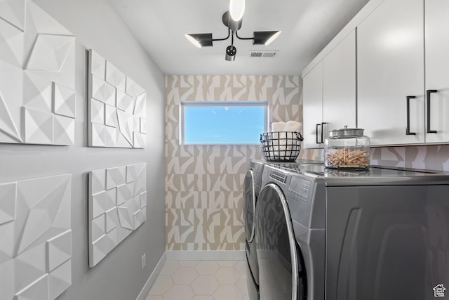 1026 W Chokecherry Dr Unit 135, Mapleton, UT 84664 - laundry area featuring washing machine and clothes dryer, cabinet space, wallpapered walls, and light tile patterned floors