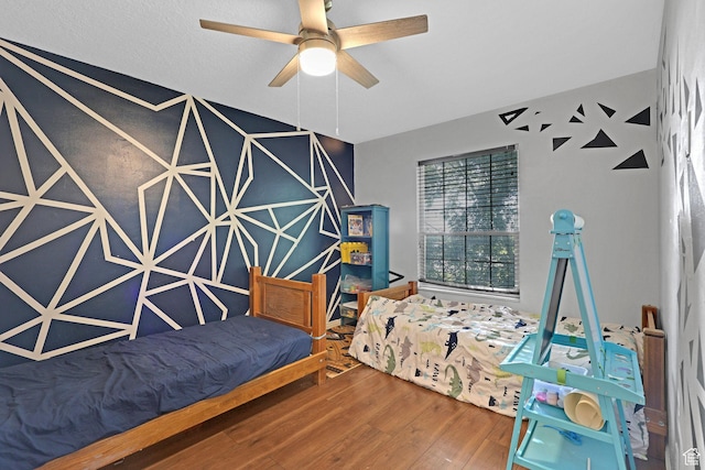 bedroom with wood finished floors