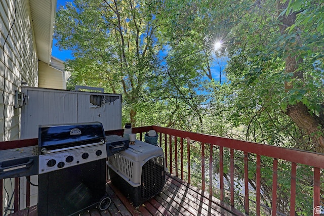 wooden deck with area for grilling