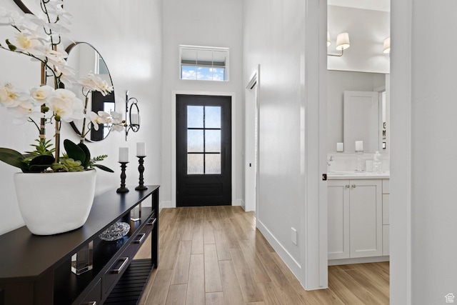 1624 W Chandler Dr, St George, UT 84770 - foyer entrance featuring light wood finished floors and a towering ceiling