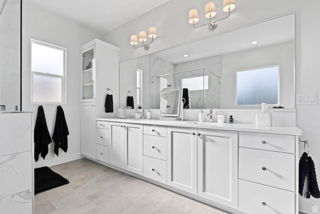 1624 W Chandler Dr, St George, UT 84770 - bathroom with double vanity and a marble finish shower