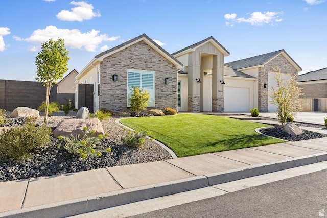 1624 W Chandler Dr, St George, UT 84770 - view of front of property with an attached garage, stone siding, stucco siding, and concrete driveway