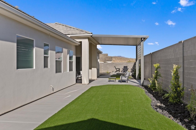 1624 W Chandler Dr, St George, UT 84770 - fenced backyard featuring a patio area