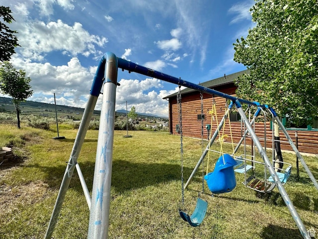 2947 S Chukar Dr, Garden City, UT 84028 - view of play area with a yard