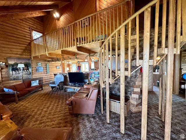 2947 S Chukar Dr, Garden City, UT 84028 - living room featuring carpet flooring, high vaulted ceiling, rustic walls, healthy amount of natural light, and wood ceiling