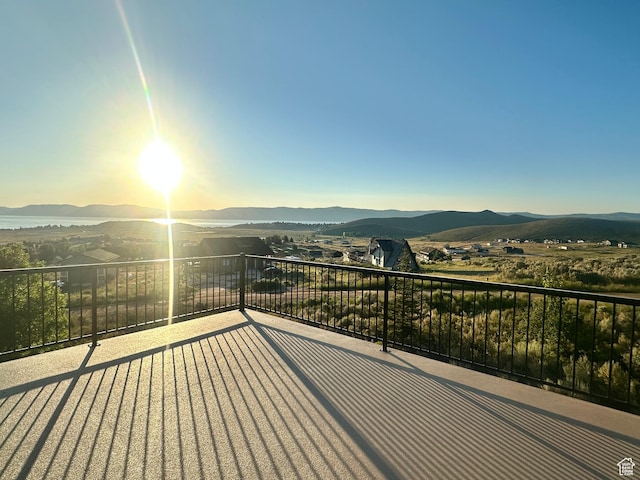 2947 S Chukar Dr, Garden City, UT 84028 - wooden terrace featuring a mountain view
