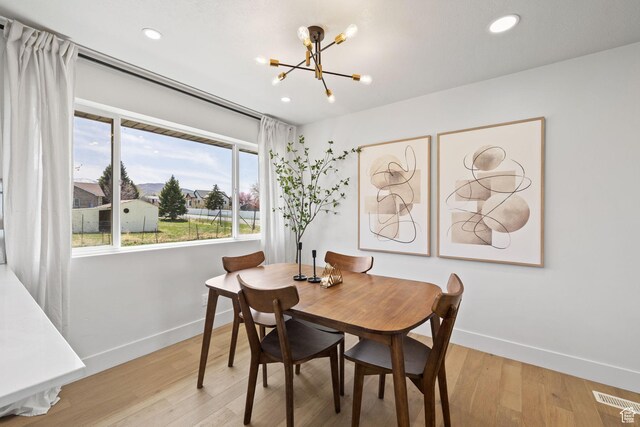205 S Highland Dr, Santaquin, UT 84655 - dining room with baseboards, light wood-type flooring, a chandelier, and recessed lighting