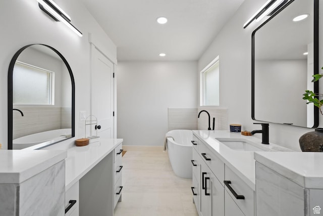 205 S Highland Dr, Santaquin, UT 84655 - bathroom with baseboards, recessed lighting, plenty of natural light, and vanity