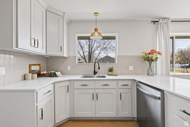 205 S Highland Dr, Santaquin, UT 84655 - kitchen with a sink, light countertops, stainless steel dishwasher, and tasteful backsplash