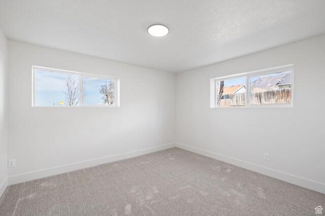 205 S Highland Dr, Santaquin, UT 84655 - carpeted empty room with baseboards