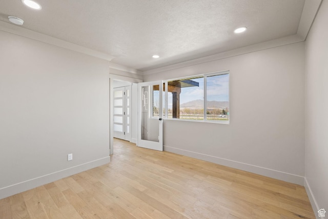 205 S Highland Dr, Santaquin, UT 84655 - unfurnished room with recessed lighting, baseboards, a textured ceiling, and wood finished floors