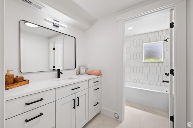 205 S Highland Dr, Santaquin, UT 84655 - bathroom with vanity, baseboards, tile patterned flooring, shower / tub combination, and visible vents