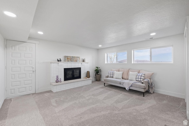 205 S Highland Dr, Santaquin, UT 84655 - carpeted living room featuring baseboards, a brick fireplace, and recessed lighting