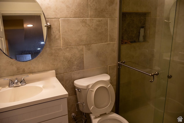 4345 S Long Valley Dr W, West Valley City, UT 84128 - full bathroom with toilet, a stall shower, vanity, and tile walls
