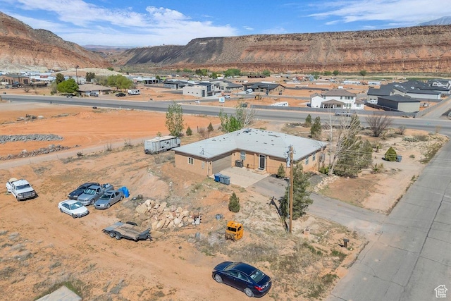 1112 S Granada Royale, Washington, UT 84780 - birds eye view of property featuring a mountain view