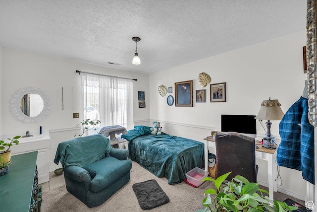 1112 S Granada Royale, Washington, UT 84780 - bedroom featuring a textured ceiling and visible vents