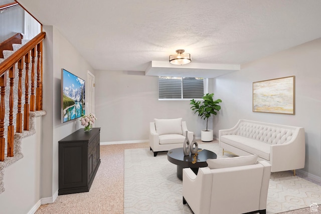 816 E 16th Ave, Salt Lake City, UT 84103 - carpeted living area featuring baseboards, a textured ceiling, and stairs