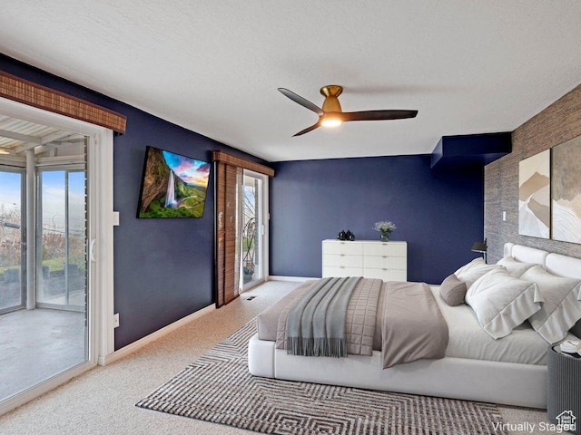 816 E 16th Ave, Salt Lake City, UT 84103 - carpeted bedroom featuring access to outside, baseboards, a ceiling fan, and a textured ceiling