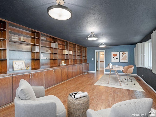 816 E 16th Ave, Salt Lake City, UT 84103 - interior space featuring a textured ceiling, baseboards, and light wood finished floors