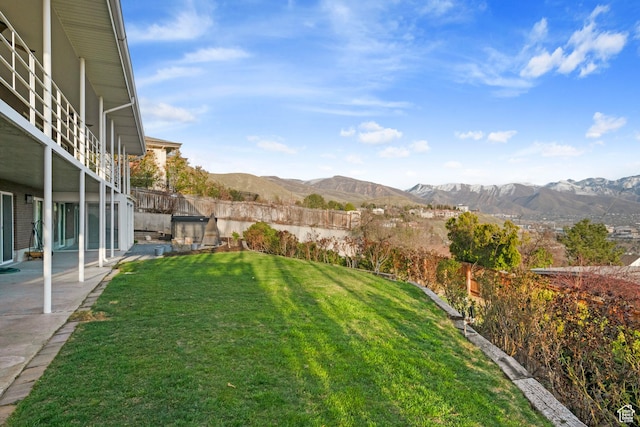 816 E 16th Ave, Salt Lake City, UT 84103 - view of yard featuring a patio, a fenced backyard, and a mountain view