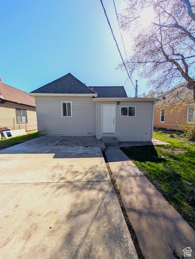 view of front of house featuring roof with shingles