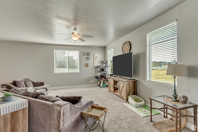 9452 S Alane Hollow Rd W, West Jordan, UT 84081 - living area with light carpet, baseboards, and ceiling fan