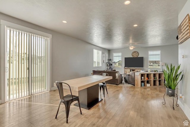 9452 S Alane Hollow Rd W, West Jordan, UT 84081 - dining room featuring baseboards, ceiling fan, a textured ceiling, recessed lighting, and light wood finished floors