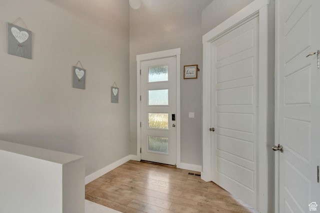 9452 S Alane Hollow Rd W, West Jordan, UT 84081 - entryway featuring light wood-style flooring and baseboards
