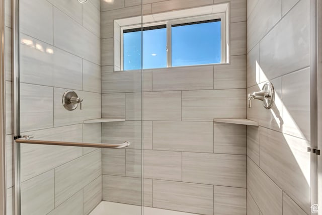 full bathroom with a shower stall