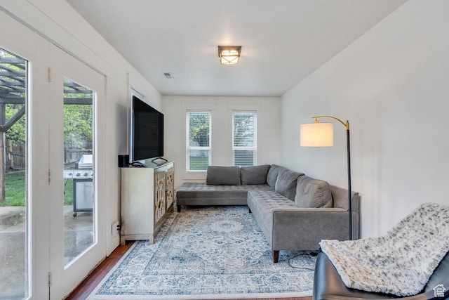 996 W 1340 N, Orem, UT 84057 - living area with wood finished floors, visible vents, and a wealth of natural light