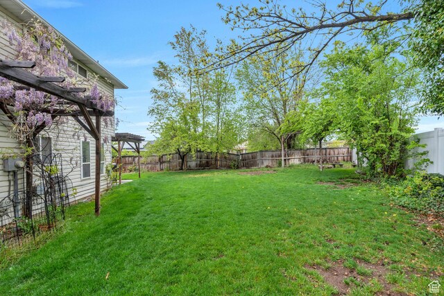 996 W 1340 N, Orem, UT 84057 - view of yard featuring a fenced backyard and a pergola