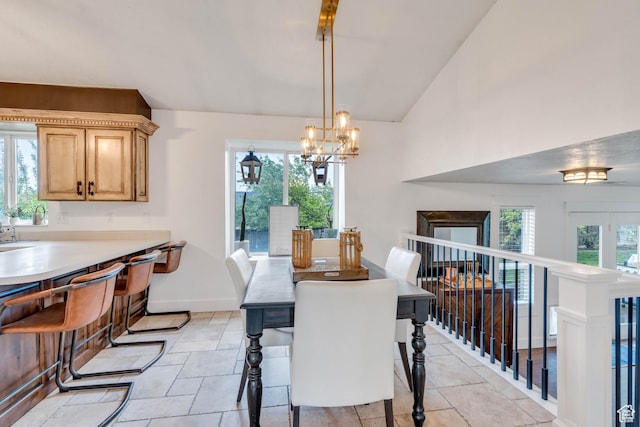 996 W 1340 N, Orem, UT 84057 - dining space with baseboards, a chandelier, and vaulted ceiling